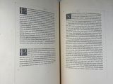 an open book with a picture of a cat on it