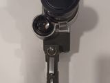 a camera that is sitting on a white surface