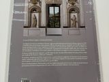 a book with a picture of a building on it