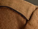 an image of a close up of a brown jacket