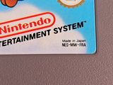 a nintendo entertainment system label on a refrigerator