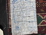 a piece of fabric with a tag attached to it