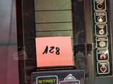 a close up of a machine with a clock on it