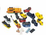 a lot of toy trains that are sitting on a table