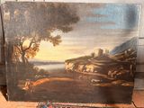 un tableau posé à même le sol d'une pièce recouverte d'un tapis