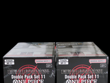 two boxes of one piece game cards on a black background