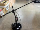 a black lamp that is on the floor in a room