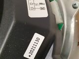 a close up of a motor with a sticker on it