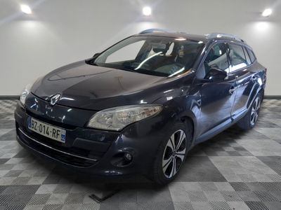 a picture of a blue car parked in a garage