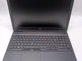 the laptop is open and ready to be used on the desk