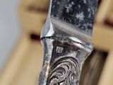 a knife that is sitting on top of a table