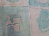 a large sheet of paper with a picture of twitter logos on it