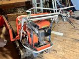 a small machine that is sitting on a wooden floor