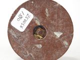 an image of a piece of metal with a tag on it