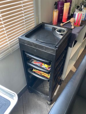 an image of a hair salon with a hair dryer on the counter