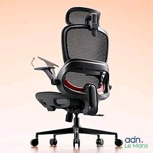 an image of a black office chair with a red seat and arm rest