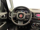 the interior of a car with a steering wheel and dashboard controls