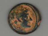 une image représentant une pièce de monnaie sur laquelle figurent une femme et un dragon