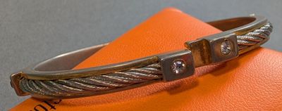 Charles JOURDAN Bracelet semi-rigide en métal bicolore serti…