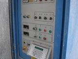 a machine that is sitting inside of a building