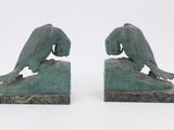 pair of art deco bookends of two birds on a rock