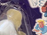 a toy that is in a package on the table