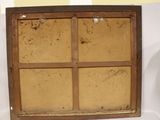 a picture of an old window with a wooden frame