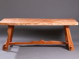 an image of a wooden bench on a grey background