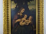 une image d'une peinture représentant une femme tenant un bébé