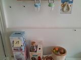 a small table with toys on it in a room