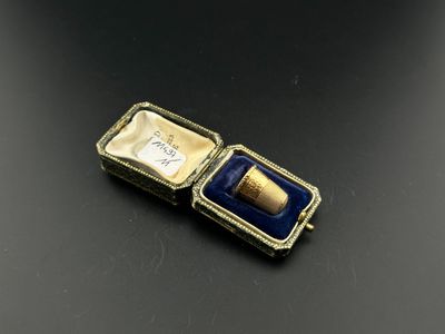 an image of a gold and blue box with a ring inside