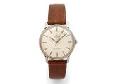 a gentleman ' s wrist watch with white dial and brown leather strap