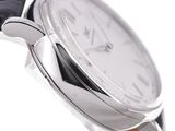 a close up of a wrist watch with a black strap