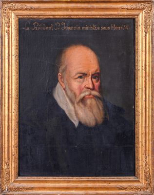 un tableau représentant un homme barbu dans un cadre en or