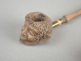 a pipe that has been carved into the shape of a bear