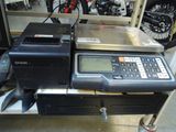 a calculator sitting on top of a table in a garage