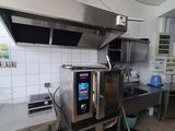 a kitchen with a lot of counter space in it