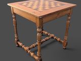 une photo d'une table en bois sur laquelle est posé un échiquier