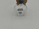 a small butterfly sitting on top of a clear object