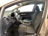 the interior of a car with the door open showing the driver ' s seat