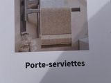 a box with a picture of a towel rack in it
