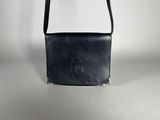 black leather cross body bag with a black leather handle