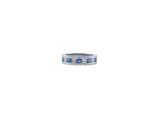 a white gold ring with blue sapphires and diamonds