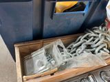 a box with chains and other items in it