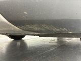 a close up of a car ' s rear end on the street