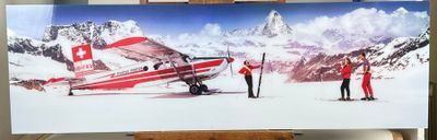 une photo d'un tableau représentant un avion posé sur un chevalet