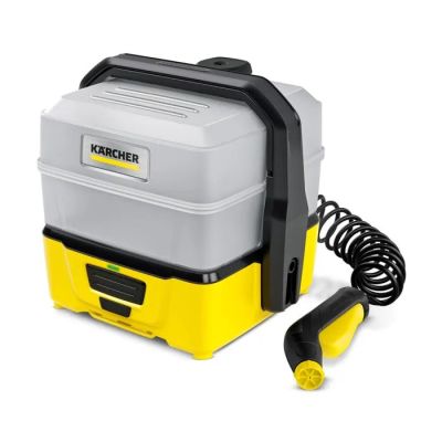 une boîte jaune et noire à laquelle est raccordé un tuyau