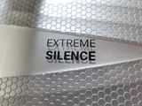 a close up of a piece of luggage with the words extreme silence on it