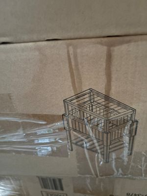 une boîte surmontée d'une cage