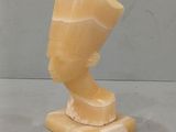 an image of a sculpture of a man ' s head on a marble base